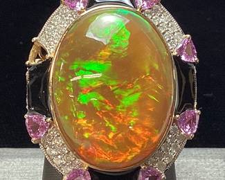 14KT YELLOW GOLD OPAL, SAPPHIRE & DIAMOND RING SIZE 8, 16.66cts OPAL, 1.52cts SAPPHIRE, 0.98cts DIAMONDS, 10.9g TOTAL WEIGHT,
GAL APPRAISAL $13,300.00, 