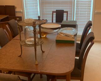 Immaculate dining room with antique, vintage MCM furniture.