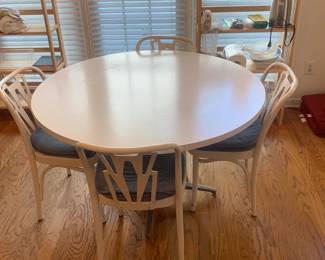 Round kitchen table with four chairs