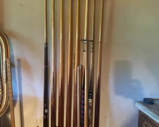 Vintage pool table and pool cues
