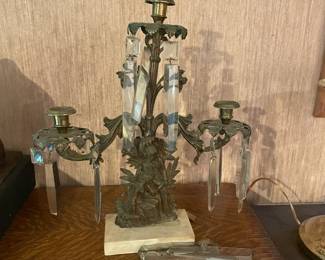 Pair of antique brass and crystal Girandole three-arm mantle candle holders with boy and girl.