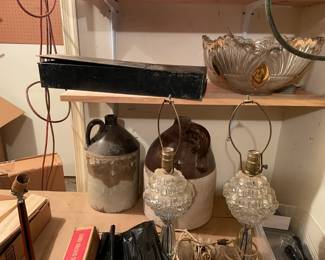 Vintage crocks and glass lamps.