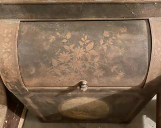 Blue floral metal coal bin.