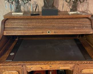 Very nice roll-top oak desk (great condition).
