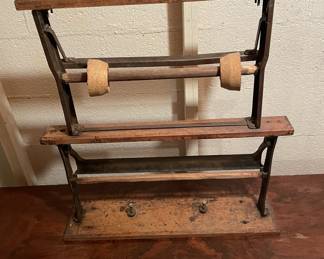 Vintage paper roll cutter.