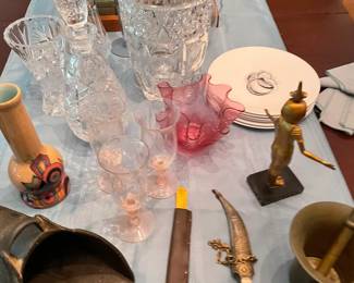 Crystal, knives and bronze.