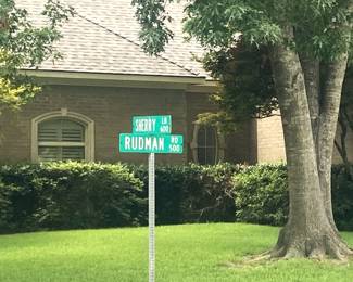 The home is at the corner of  Rudman Road and Sherry Lane.