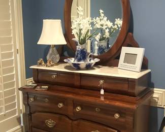 Dresser and oval mirror