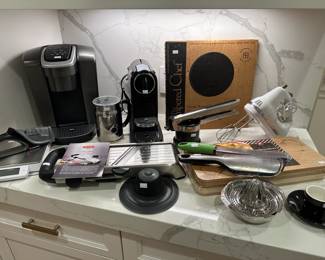 Microplane Zester/Shredder, Crate & Barrel Espresso Cup, OXO Mandoline Slicer 2.0, OXO Potato Ricer,	Salter Scale, Wusthof Knife Sharpener, Nespresso Citiz, Nespresso Milk Frother, Keurig K-elite, 	Pampered Chef Round Stone
