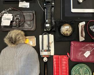 Coach , Vtg Coach leather wristlet, Grant Thornton Shelby GT500 Ceramic, Vtg. Estée Lauder Solid Perfume Powder Compact, Ruger lock, Carhartt hat