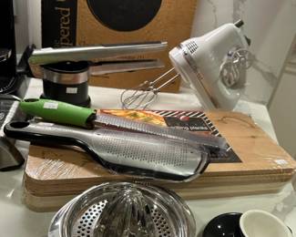 Pampered Chef Round Stone, OXO Potato Ricer, KitchenAid Mixing Bowls