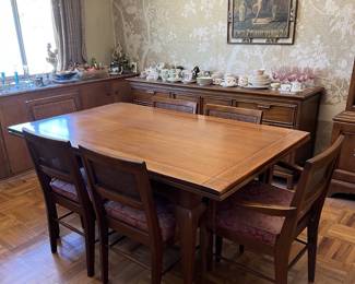The leaves for this table extend out from each end, and pack away under the main table piece when not in use.