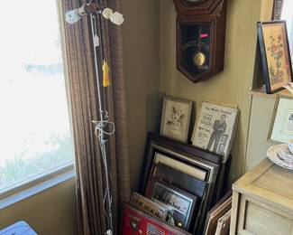 This vintage wall-clock with the Regulator label.  The vintage floor lamp is here, too.