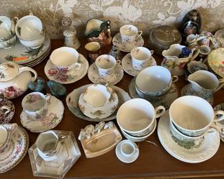 This collection of cups and saucers is impressive.