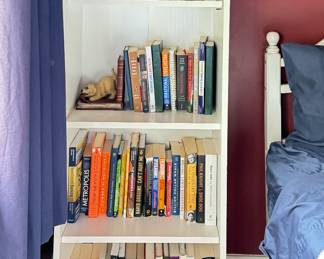 White Four Shelf Bookcase. Measures 23" x 12" x 60" H. 