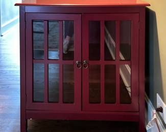 Red Two-Drawer Cabinet. Measures 32" W x 15" D x 32" H. 