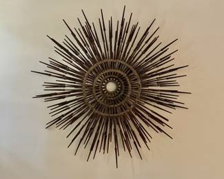 Metal "Arrow" Wall Art. Measures 30" D x 6" Thick. Photo 1 of 4. 