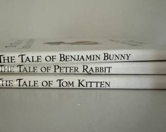 The Tale of Benjamin Bunny, The Tale of Peter Rabbit, The Tale of Tom Kitten books by Beatrix Potter. 