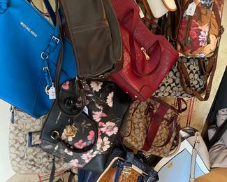 Coach, Michael Kore, Kim Rogers, … name brand purses…