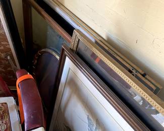 Artwork, 3 mirrors (2 rectangle one circle), and architecture drawing boards (2 in back)