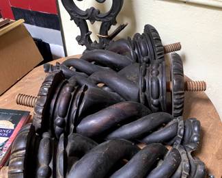 Legs and music stand from an 1858 Jacob Chickering piano. Solid rosewood. Pedals from the piano in the back. 