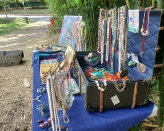 Suitcase full of costume jewelry
