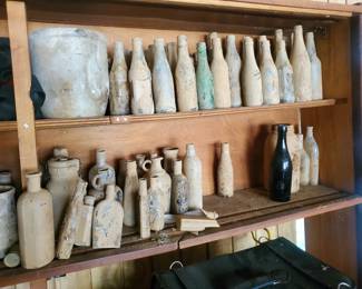 Small subset of all the antique and vintage bottles dug out from under the crawlspace of the historic home.  We have many, many more; and a large number are cleaned. 