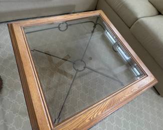 Glass top coffee table with iron legs (39 x 39 x 14)