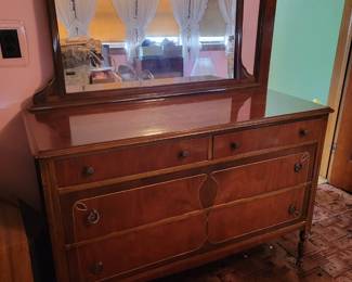 Lovingly cared for, three piece Art Deco bedroom suite. Mahogany and walnut, early 1900's. Dresser, Bed Frame & Vanity. 