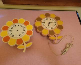 Mid Century Modern Flower Wall Clocks.
