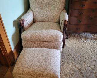 Beautiful antique rocking arm chair with wood and metal feet. 