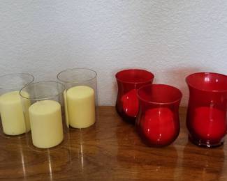 Two Sets Of Candle Holders With Candles