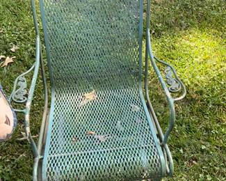Outdoors in back of the house - Metal chair