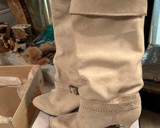 New, one scratch on left boot