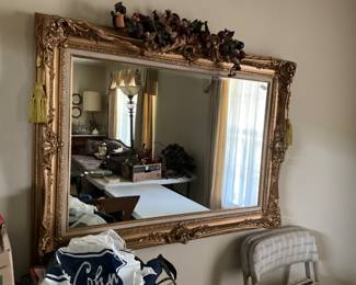 Large ornate mirror in living room