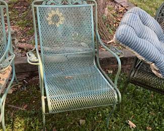 Outdoors in back of the house - Metal chair