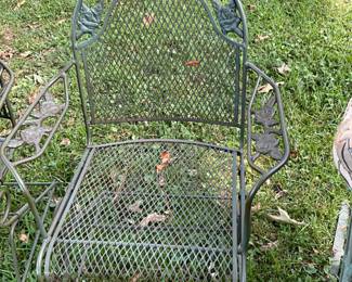 Outdoors in back of the house - Metal chair