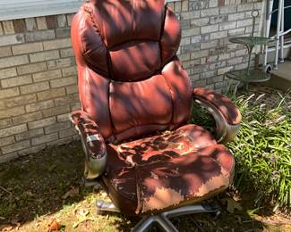 Outdoors in back of the house - old office chair