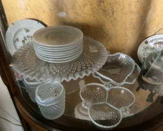 Collectibles in curio cabinet