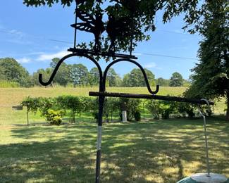 Outdoors in back of the house - Top of shepherd’s hook