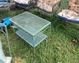 Outdoors in back of the house - Metal table