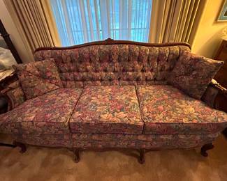 Vintage wood trim sofa on legs