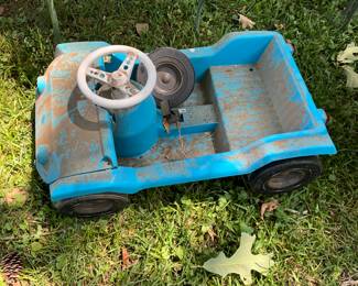 Outdoors in back of the house - Toy car