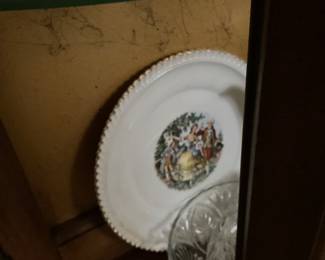 Platter in curio cabinet