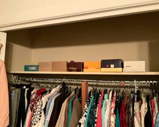 Clothing & shoes new in box in closet