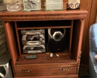 Cabinet in den with subwoofer etc