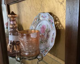 Collectibles in curio cabinet