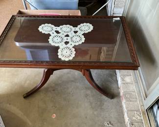 Vintage coffee table with glass top