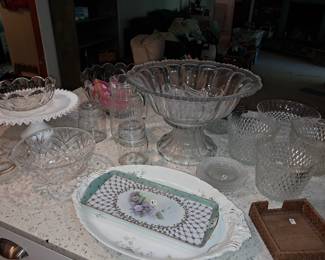 Glass...nice punch bowl with the base