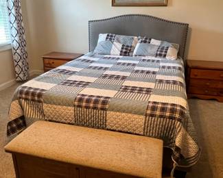 Full size bed with upholstered bedframe and headboard and newer Tencel mattress